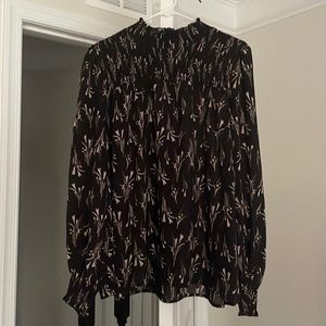 Black floral blouse